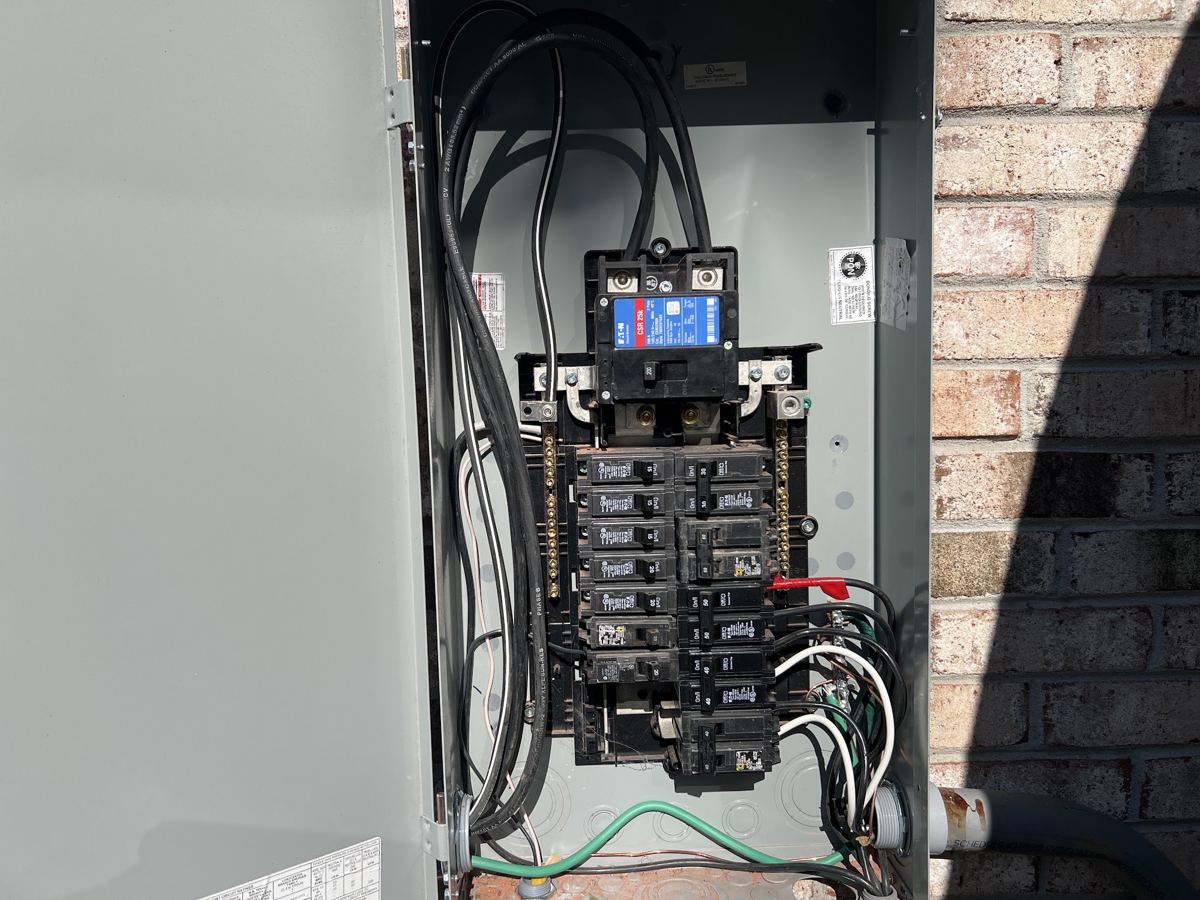 Electrical panel opened up and checked.