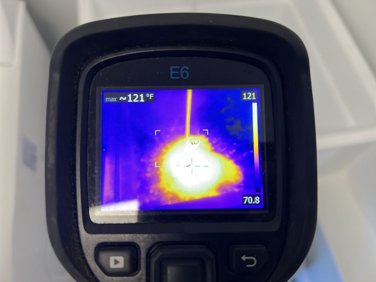 Thermal scan of a light fixture to spot heat the eye can’t see.